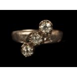 * Ring. Rose gold and 3-stone diamond ring