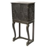 * Cabinet on Stand. 18th century ebonised cabinet on stand