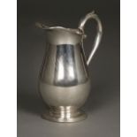 * Jug. Edwardian silver baluster jug by Cooper Brothers & Sons, Sheffield 1924