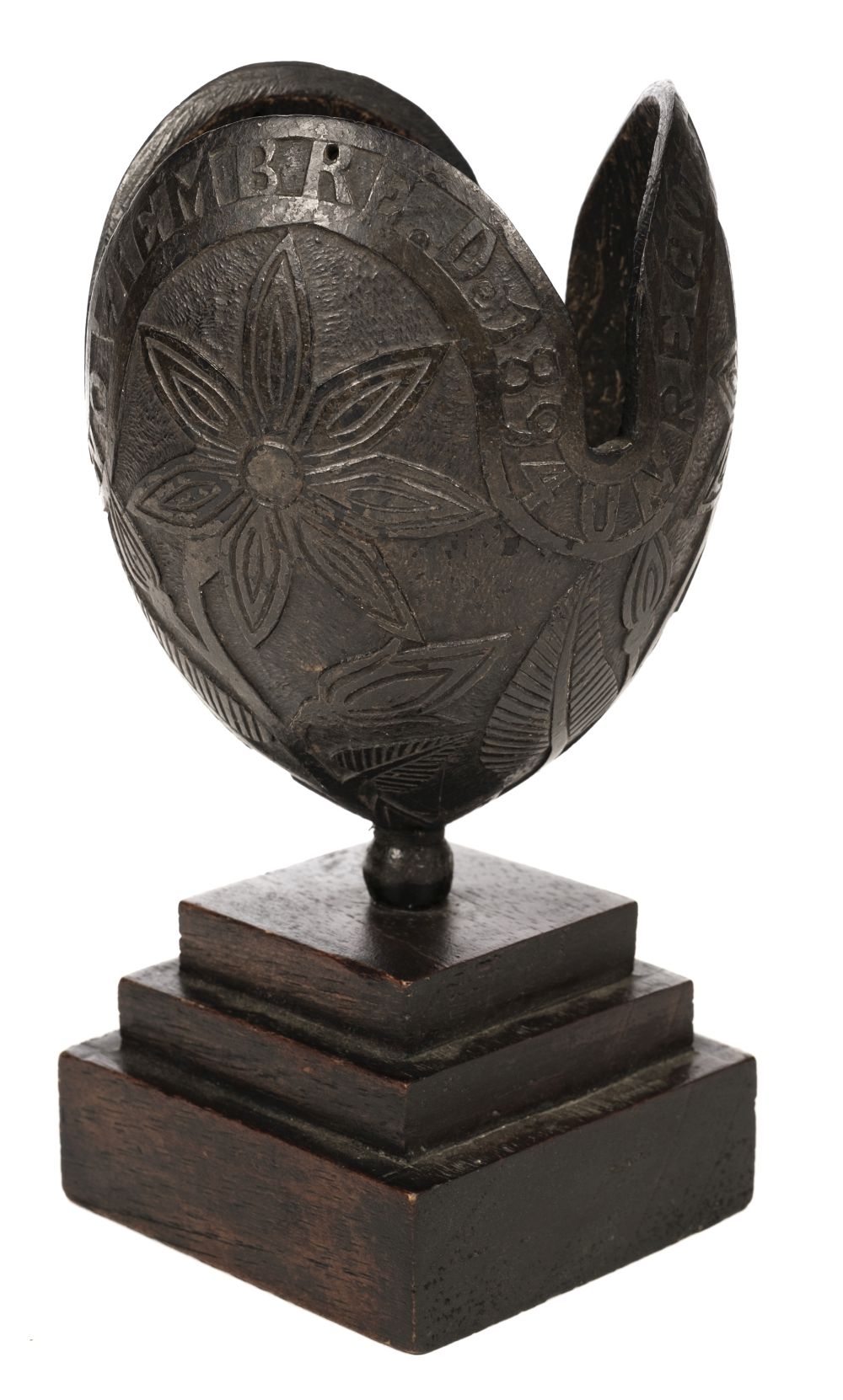 * Coconut. A 19th century carved coconut