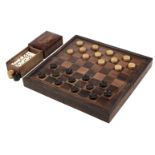 * Draughts. Victorian boxwood draughts and dominoes