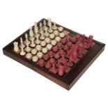 * Chess. A 19th-century Calvert style ivory chess set