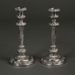 * Candlesticks. A pair of George III silver candlesticks