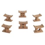 * Ashanti. A large collection of miniature wooden stools