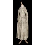 * Dress. A chequered cotton day dress, circa 1850