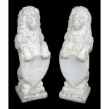* Lions. A pair of reconstituted stone lions