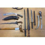 Kris. An Indonesian kris and various edged weapons