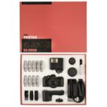 Pentax Auto 110 SLR System sub-miniature film camera kit with 3 lenses and 9 filters