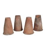 A MATCHED SET OF FOUR VICTORIAN TERRACOTTA RHUBARB FORCERS,