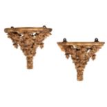 A PAIR OF GILTWOOD AND COMPOSITION WALL BRACKETS IN LOUIS XV TASTE,