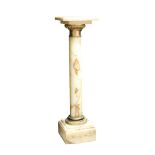 A CONTINENTAL ONYX AND GILT METAL MOUNTED PEDESTAL,