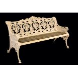 A VICTORIAN WHITE PAINTED CAST IRON GARDEN BENCH,