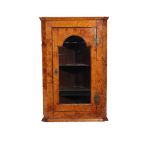 A GEORGE III BIRDSEYE MAPLE HANGING CORNER CABINET,