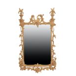 A PAIR OF CARVED AND GILTWOOD FRAMED WALL MIRRORS IN LOUIS XV STYLE,