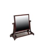 A GEORGE IV MAHOGANY DRESSING TABLE MIRROR, IN THE MANNER OF GILLOWS,