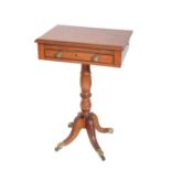 A LATE GEORGE III MAHOGANY READING TABLE,