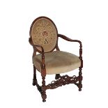 A WALNUT AND UPHOLSTERED FAUTEIL IN LOUIS XIV STYLE,