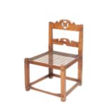 A SOUTH AFRICAN CAPE COLONY HARDWOOD LOW CHAIR,