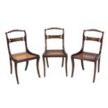 A SET OF SIX REGENCY GRAINED ROSEWOOD AND BRASS INLAID DINING CHAIRS,