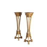 A PAIR OF CARVED AND GOLD PAINTED WOOD JARDINIERE STANDS IN NEOCLASSICAL TASTE,