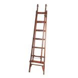 A STAINED OREGON PINE HOUSEKEEPER'S STEP LADDER,