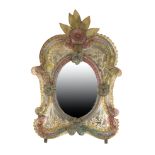 A VENETIAN MOULDED GLASS WALL MIRROR,