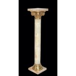 A CONTINENTAL GREEN ONYX AND GILT METAL MOUNTED COLUMNAR PEDESTAL,