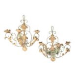 A PAIR OF CONTINENTAL PAINTED WROUGHT IRON THREE LIGHT WALL APPLIQUES,