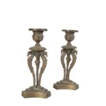 A PAIR OF REGENCY BRONZE CANDLESTICKS