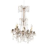 A GILT METAL AND GLASS HUNG TWELVE LIGHT CHANDELIER,