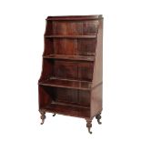 A REGENCY MAHOGANY 'WATERFALL' BOOKCASE,