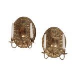 A PAIR OF DUTCH STYLE BRASS REPOUSEE WALL LIGHTS