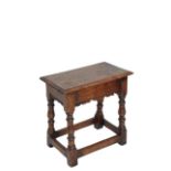 AN OAK JOINT STOOL IN 17TH CENTURY STYLE,