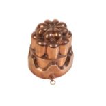 A LARGE VICTORIAN CASTELLATED COPPER 'JELLY' MOULD,