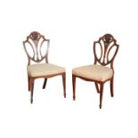 A SET OF FOUR PAINTED MAHOGANY UPHOLSTERED SIDE CHAIRS, IN SHERATON STYLE