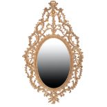 A GEORGE III CARTON-PIERRE FRAMED WALL MIRROR,