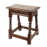 AN OAK JOINT STOOL IN 17TH CENTURY STYLE,
