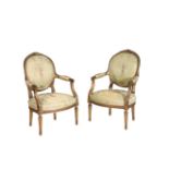 A PAIR OF CARVED AND GILTWOOD FAUTEUILS, IN LOUIS XV TRANSITIONAL STYLE,