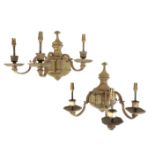 A PAIR OF BRASS TWIN LIGHT WALL APPLIQUES IN REGENCE STYLE,