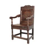 A CHARLES II OAK WAINSCOT CHAIR,