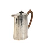 AN VICTORIAN SILVER HOT WATER JUG