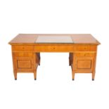 A NORTH EUROPEAN SATINBIRCH DESK IN BIEDERMEIER STYLE,