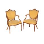 A PAIR OF GEORGE III CARVED BEECH AND UPHOLSTERED FAUTEUILS,