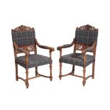 A PAIR OF CARVED WALNUT AND UPHOLSTERED ELBOW CHAIRS IN FRENCH 17TH CENTURY STYLE,