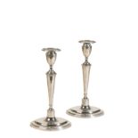 A PAIR OF HALLMARKED SILVER CANDLESTICKS,