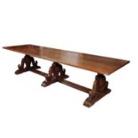 A SUBSTANTIAL OAK TRESTLE TABLE,