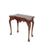 AN IRISH GEORGE II MAHOGANY CARD TABLE,