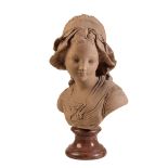A CONTINENTAL SCULPTED TERRACOTTA BUST OF A GIRL, IN 18TH CENTURY STYLE,