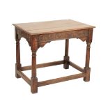 AN OAK SIDE TABLE IN CHARLES II STYLE,