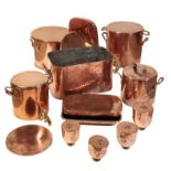 A GROUP OF COPPER DOMESTIC VESSELS AND UTENSILS,